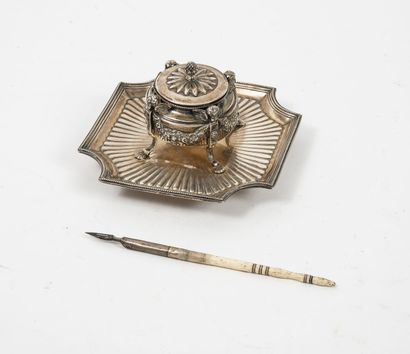 null Silver inkwell (950) circular decorated with flowered garlands, resting on four...