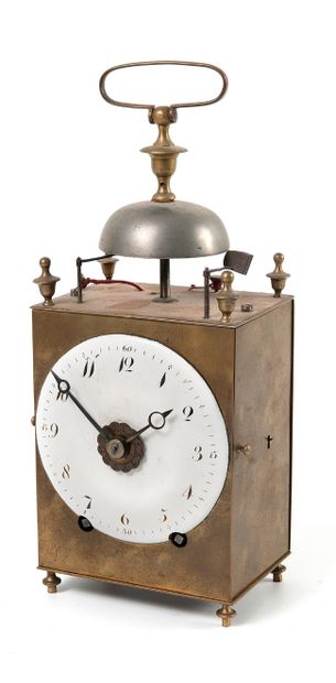 null 
CAPUCINE CLOCK In brass, the enamel dial with two hands and index for the alarm....
