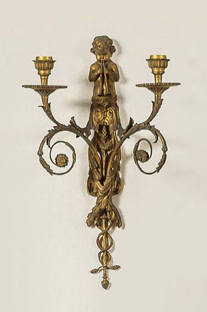 null 
PAIR OF SCONCES 



In gilt bronze, with two arms of lights, the shaft in bust...