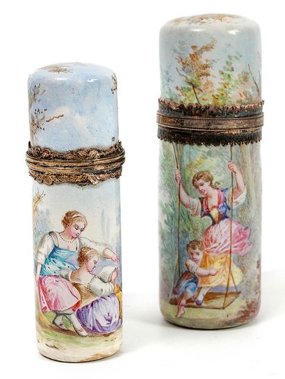 France Two cylindrical porcelain salt or perfume bottles with revolving decorations...