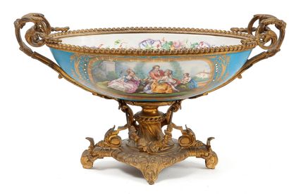 null 
LARGE OVAL CUP In polychrome and gold porcelain in the taste of Sevres and...