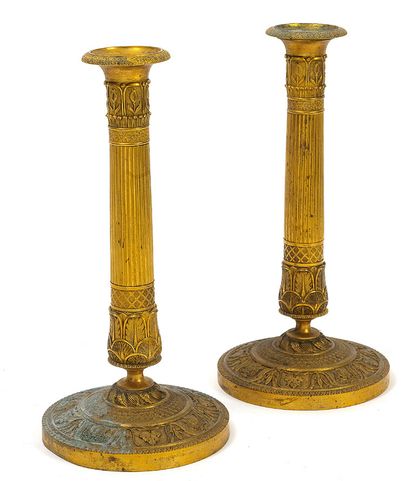 null 
PAIR OF TORCHES 



In gilded brass, the ribbed stem ringed with leaves. With...