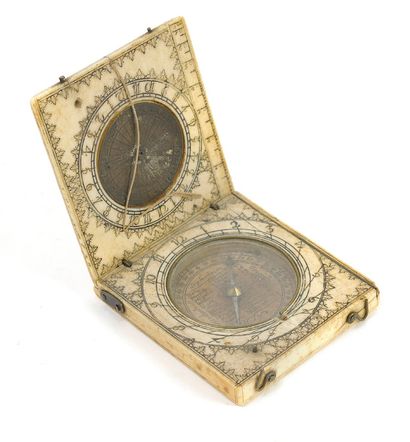 France Portable diptych sundial with wire axis.
Square ivory case (pre-Convention),...