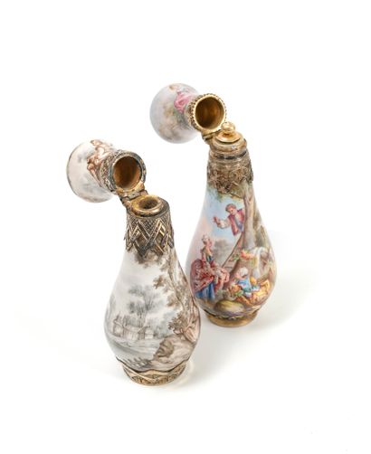 France Two porcelain salt or perfume bottles with polychrome or brown cameo decorations,...