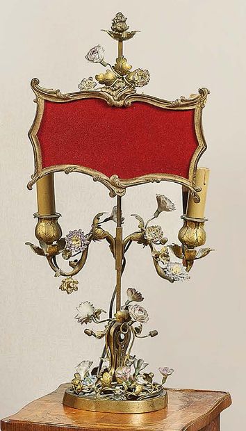null 
A gilt bronze two-armed MOBILE SCREEN LAMP decorated with a gilt brass and...