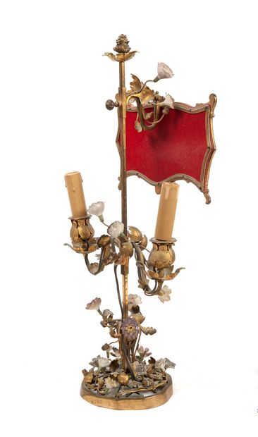 null 
A gilt bronze two-armed MOBILE SCREEN LAMP decorated with a gilt brass and...