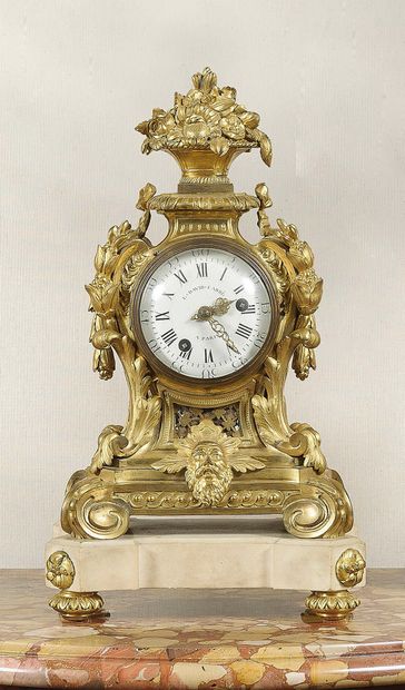null 
CLOCK 



In chased and gilt bronze, violin-shaped, with enamel dial signed...