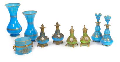 null 
LOT OF OPALINES Comprising :



- A pair of blue bottles, brass mount with...