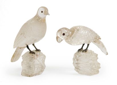 null 
LOT INCLUDING



- Two rock crystal birds, the eyes ruby, the legs silver plated...