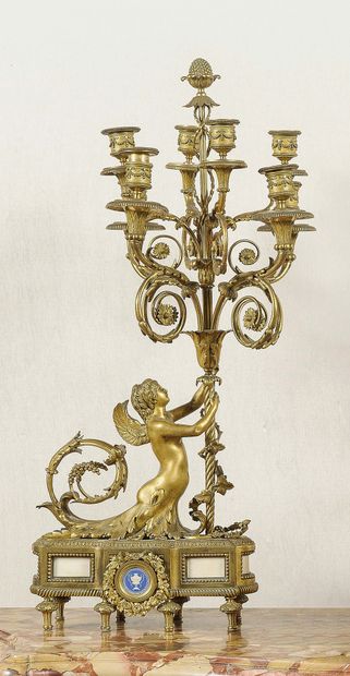 null 
A Pair of large CANDELABRES In finely chased and gilded bronze, the bouquets...