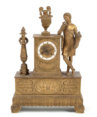 null 
A gilded bronze hanged lamp with a young man holding a cornucopia, leaning...