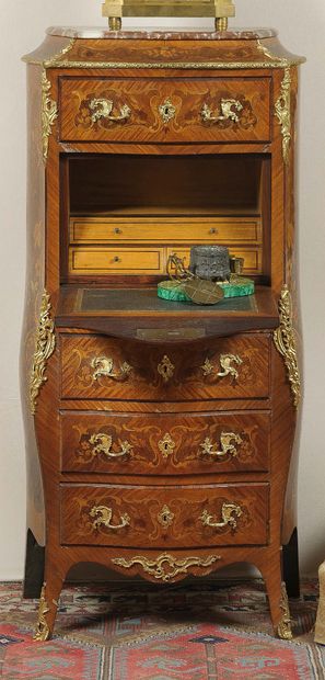 null 
A DOUCINE SECRETARY Inlaid with floral scrolls and insects, opening with four...