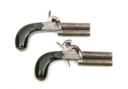 BELGIQUE Pair of two-shot capsule percussion pistols.
With engraved scroll cases,...