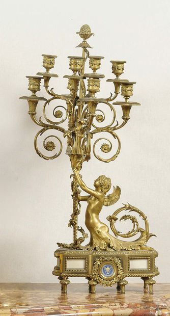 null 
A Pair of large CANDELABRES In finely chased and gilded bronze, the bouquets...