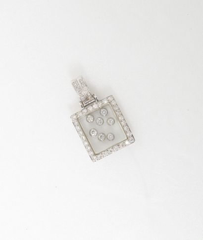 null Rectangular pendant in white gold (750) centered with seven brilliant-cut diamonds,...