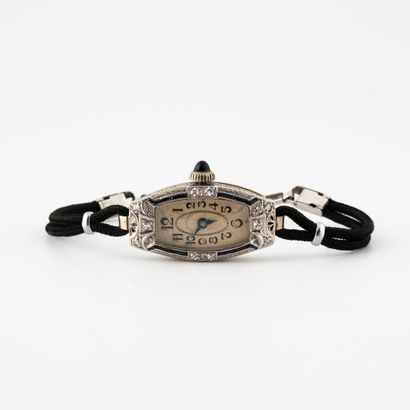 OLLENDORFF Montre bracelet de dame. 

Boîtier tonneau en or gris (750). 

Lunette...