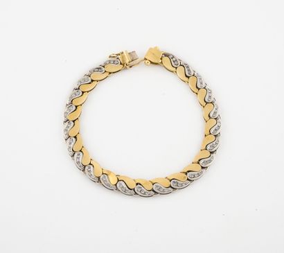 null Bracelet articulé en ors jaune et gris (750) à maillons aplatis en forme de...