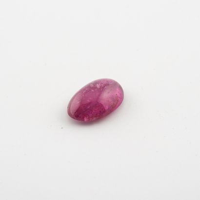 Rubellite tourmaline in oval cabochon, on...