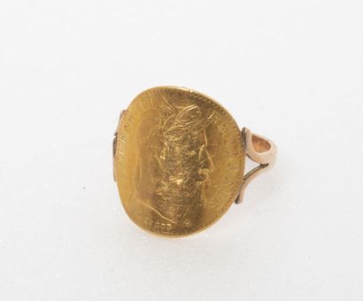 null Yellow gold ring (585) set with a 10 francs Napoleon III 1866 gold coin. 

Weight...