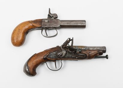 null Two travel pistols :

- one flintlock, from the second half of the 18th century.

The...