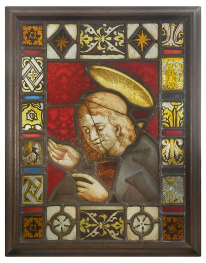 null 
Stained glass window depicting a holy figure, probably Saint John.




In polychrome...