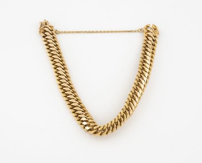 null Yellow gold (750) bracelet with American mesh. 

Ratchet clasp with chain and...