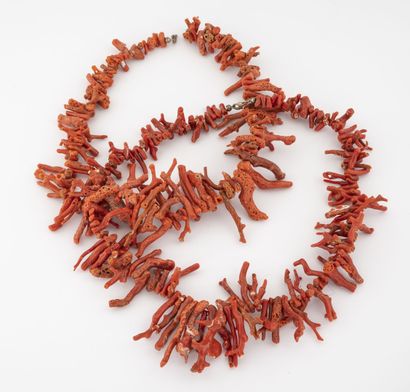 Two long necklaces of red coral branches...