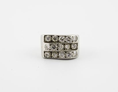 A platinum (850) pinky ring set with three...