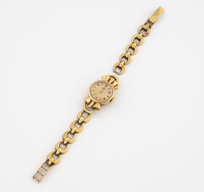 BREGUET 
Montre bracelet de dame en or jaune (750).



Boîtier rond en or jaune (750).



Cadran...
