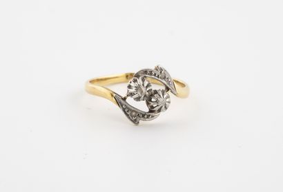 null Yellow and white gold (750) ring set with small rose-cut diamonds. 

Gross weight:...