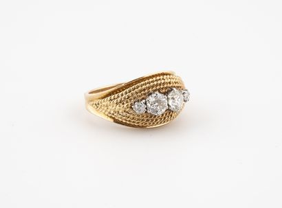 null Yellow gold (750) and platinum (850) ring set with four old cut diamonds. 

Circa...