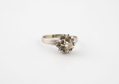  White gold (750) solitaire ring centered on a heart-shaped brilliant-cut diamond,...