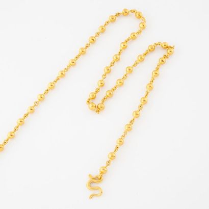 null Long necklace in yellow gold (750) with ball link. 
S clasp.
Gross weight: 56.3...