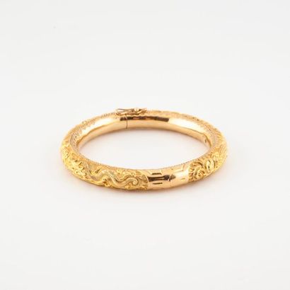 Bracelet jonc ouvrant en or jaune (750) creux,...
