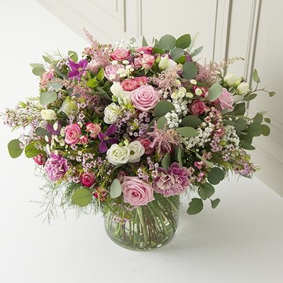 Quatre bouquets de fleurs Interflora de la Collection Prestige 