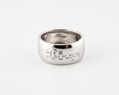 POIRAY White gold (750) band ring chased with the brand's name and adorned with a...