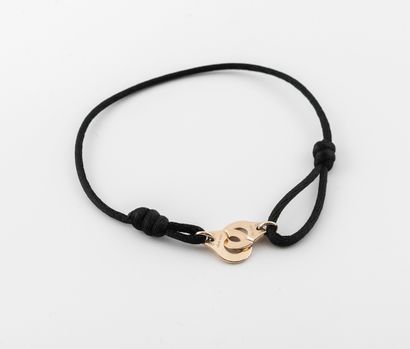 DINH VAN, Menottes Black cotton cord bracelet and handcuffs clasp in white gold (750)....