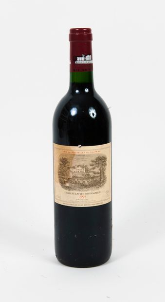 Château Lafite Rothschild A bottle, 1993. 

Low neck level

Small tear on the label...