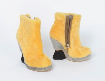 FENDI Roma Pair of yellow and grey fur and natural suede ankle boots, round toe.

Wedge...