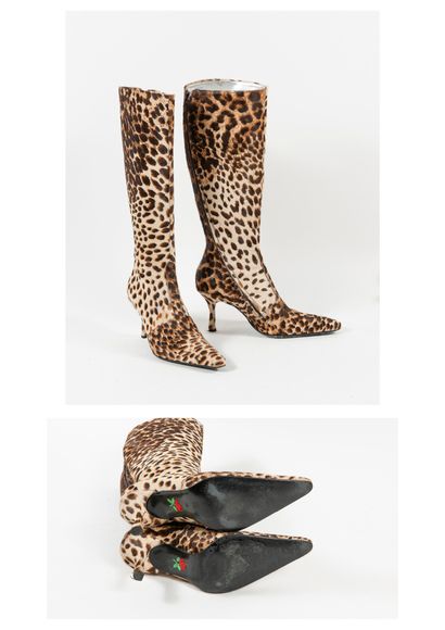 FREE LANCE Pair of leopard print pointy toe boots with zip fastening on the inside...