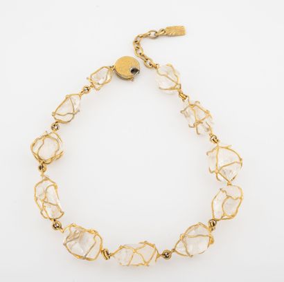Yves Saint LAURENT Necklace in gold metal and rock crystals. 

Spring ring clasp,...