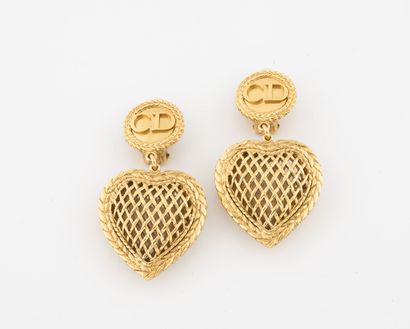 Christian DIOR Boutique Pair of ear clips in gilded metal made up of a round medallion...