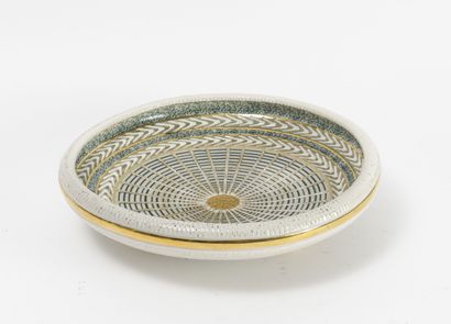 Jacques BREUGNOT (XXème siècle) Circular bowl.

In enamelled earthenware polychrome...
