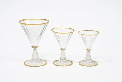 DAUM Nancy Part of service of glasses out of colorless glass blown and gilded including:...