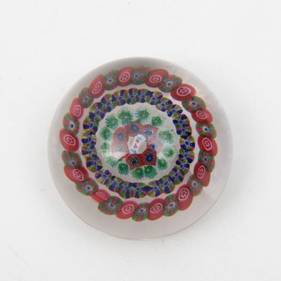 BACCARAT Colorless crystal ball, paperweight, decorated with concentric circles of...