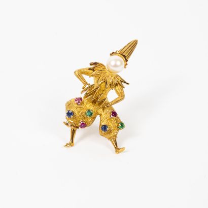 Clown brooch in yellow gold (750) set with...