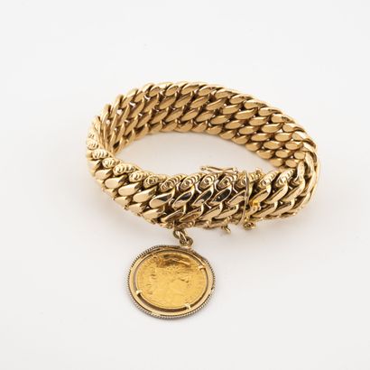 null Bracelet in yellow gold (750) with an American link, decorated with a 20 francs...