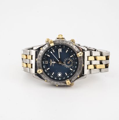 BREITLING Men's wristwatch in steel and yellow gold (750). 

Round case.

Dial with...