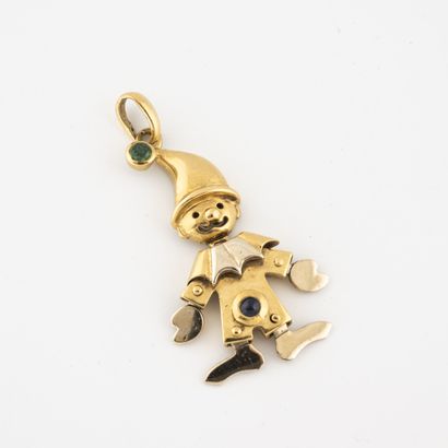  Clown pendant in two-tone gold with sapphire and emerald cabochons in closed setting....