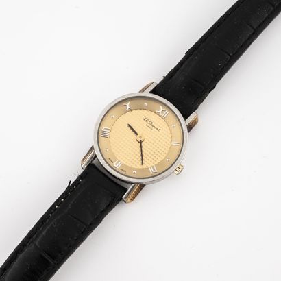 S.T. DUPONT Ladies' wristwatch. 

Round case in steel and gilded metal. 

Dial with...